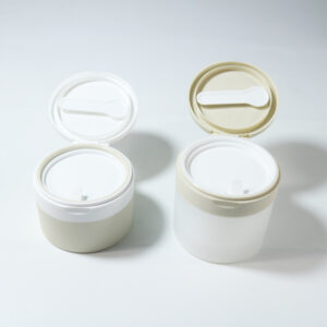 Featured image for the 50g 100g=plastic replaceable face cream jar with small spoon guide